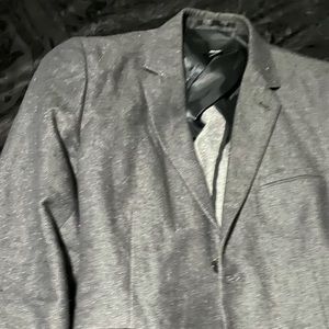 H&M black denim with light grey elbow patches.